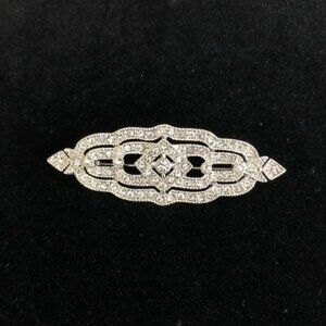 Vintage-Inspired Silver Rhinestone Brooch 2.5"x1" Elegant Filigree Design